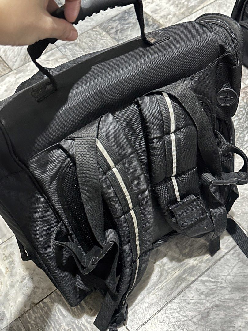 Black Makeup Artist Train Case Backpack Bag (Category: Makeup) located in Antipolo. Submitted by ttrends (Listing ID 1446517778, Image 3). Description: - Black makeup artist backpack - Multiple compartments for organized tool storage - Top handle and backpack straps for easy carrying - Side mesh pockets - Durable material - Ideal for travel and professional use ***please manage your expectation, it is a well-loved item and has normal signs of wea