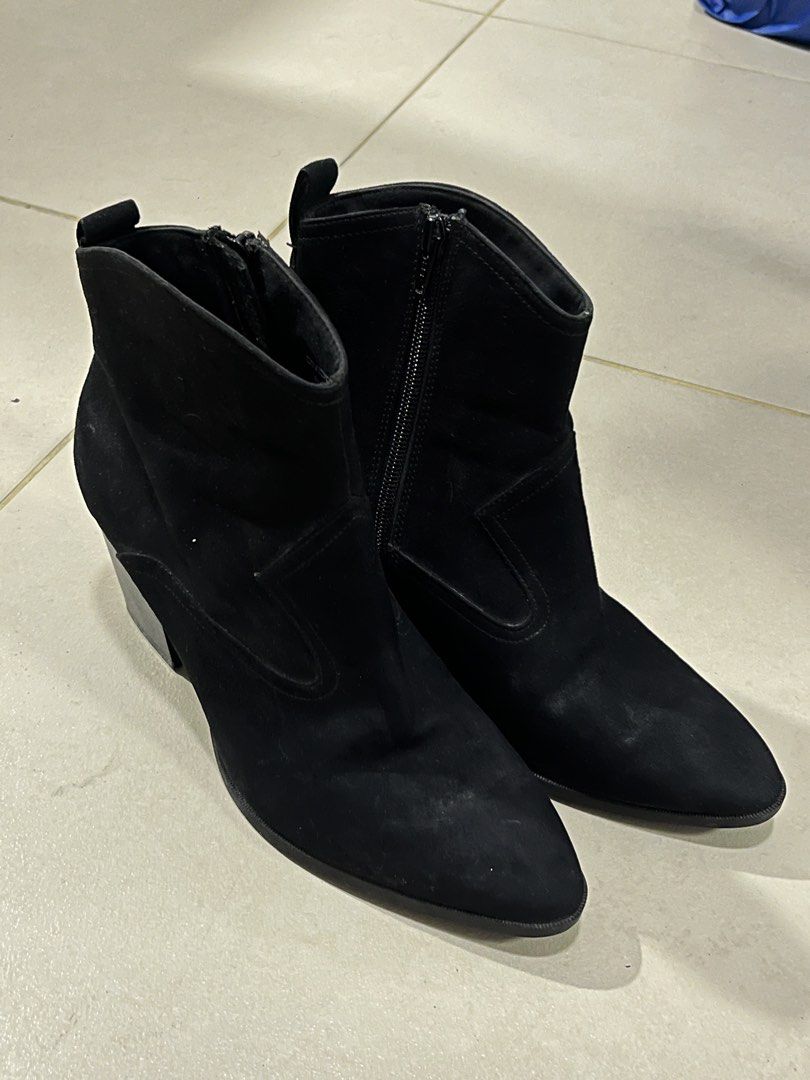 Black Suede Ankle Boots with Block Heel (Category: Boots) located in Pasay City. Submitted by losient (Listing ID 1446396630, Image 1). Description: - Black suede ankle boots - Size 40 - Pointed toe - Block heel - Side zip closure for easy wear - Versatile for dressing up or down.