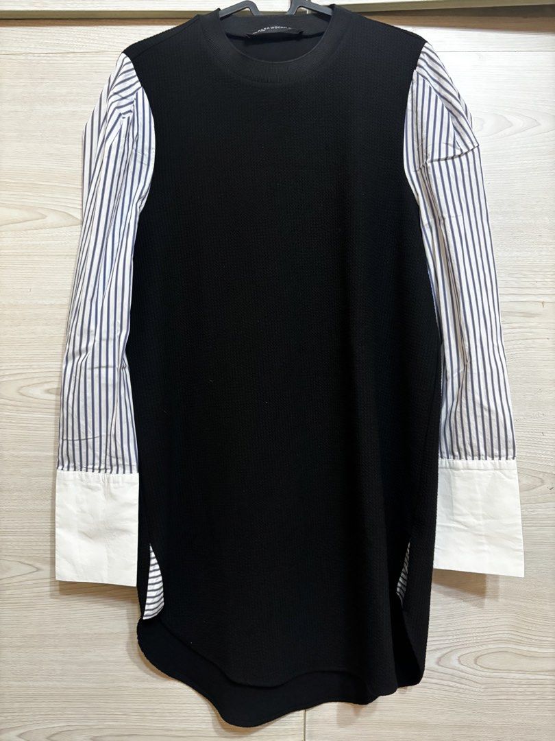 Black Textured Top with Striped Sleeves (Category: Dresses) located in Quezon City. Submitted by pipsqueakscorner (Listing ID 1446405826, Image 1). Description: - Stylish black top with a textured front. - Contrasting white and blue striped long sleeves. - Buttoned cuffs for adjustable fit. - Curved hemline with convenient side slits. - Measurements: Chest approx. 18 inches, Length approx. 27 inches. - Versatile piece, great for layering or weari
