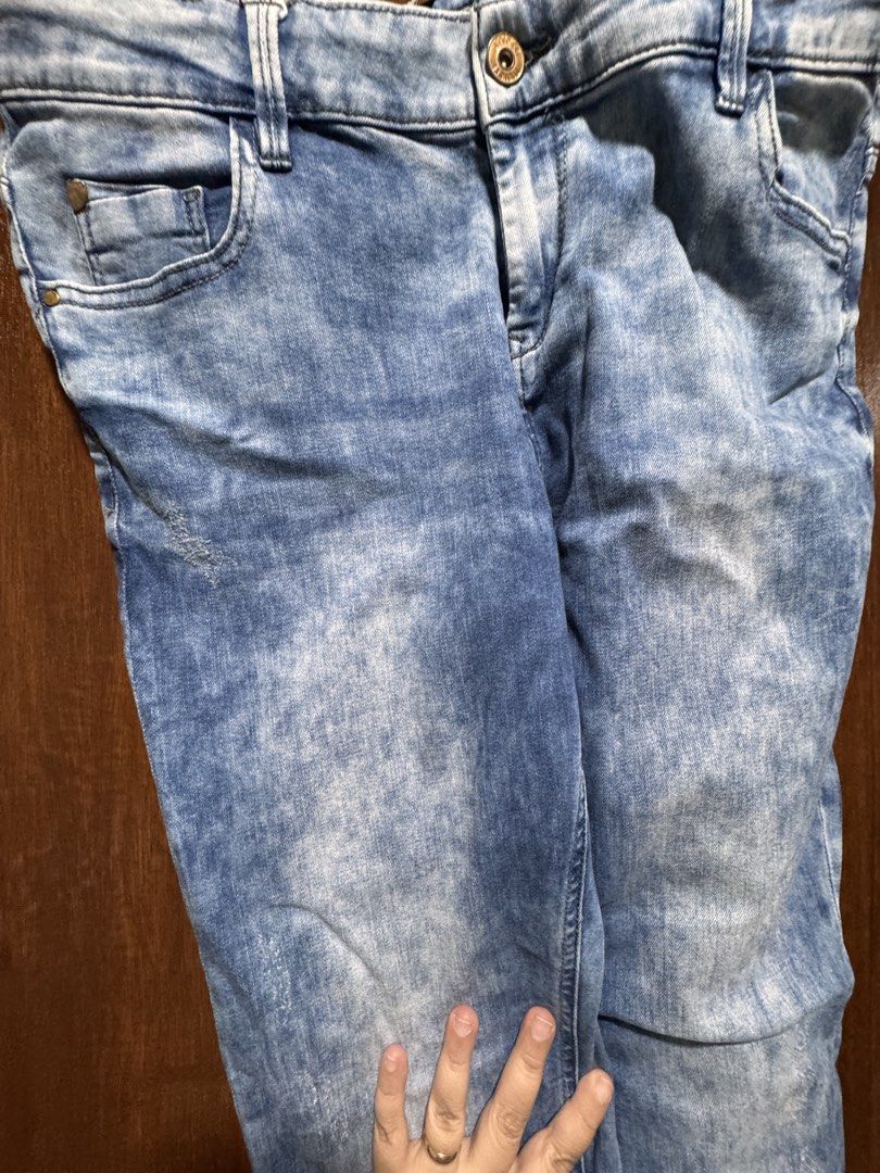 Blue Acid Wash Denim Jeans (Category: Jeans) located in Quezon City. Submitted by KK_declutterluxx (Listing ID 1446437546, Image 2). Description: - Cool acid wash jeans - Classic blue denim with a distressed look - Button and zip closure - Pockets in front and back - Comfortable fit for everyday wear - A great addition to your wardrobe -stretch -best fit 32 to 34 in waistline.