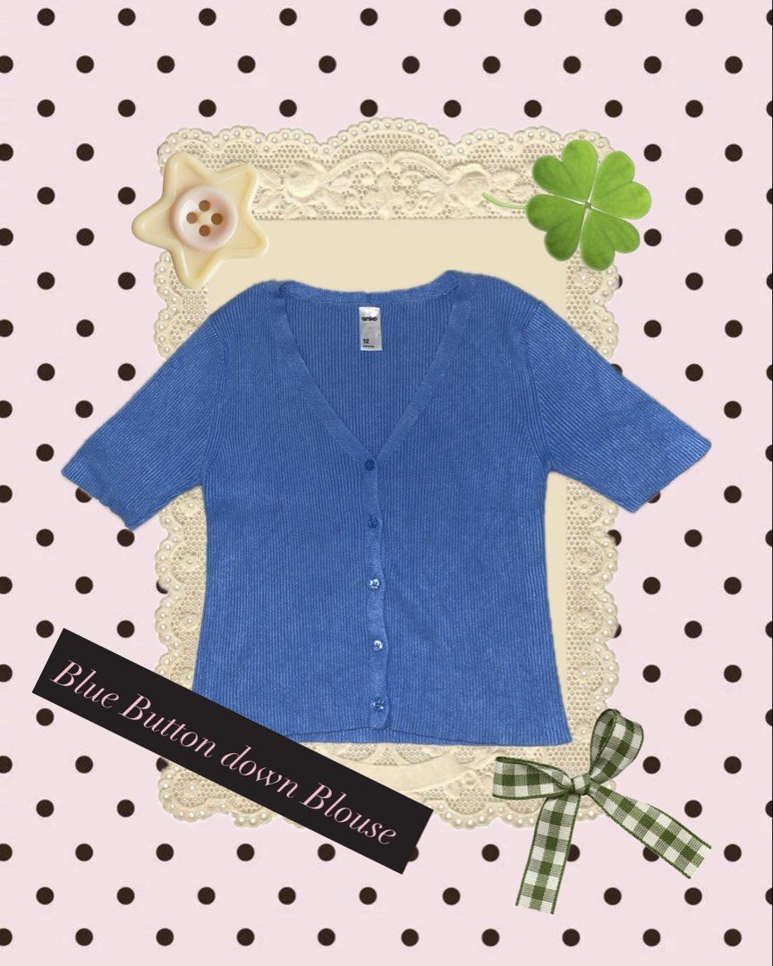 Blue Button Down Short Sleeve Blouse (Category: Blouses) located in Aurora. Submitted by decluttersbymar (Listing ID 1446397169, Image 1). Description: - Cute blue button-down blouse - Short sleeves - V-neckline - Ribbed texture - Estimated size XS or S - Versatile: great for layering or wearing on its own - Easy to style.