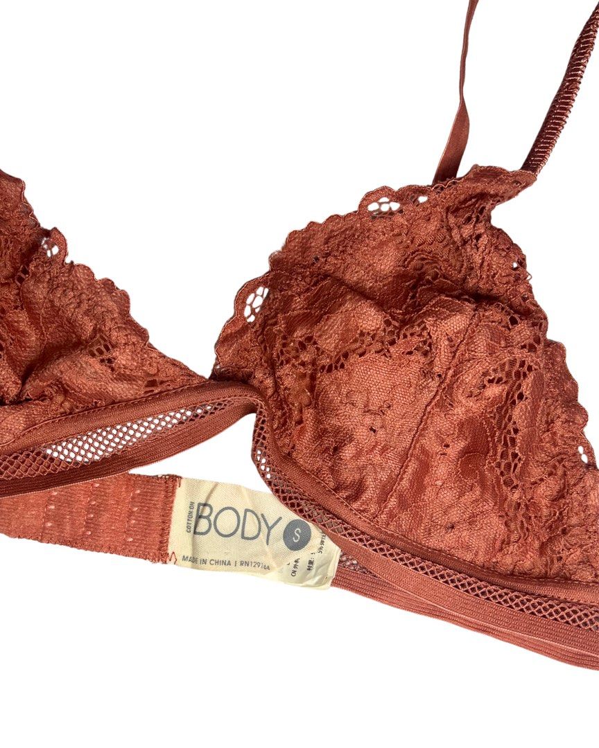 BODY Lace Bralette Size S (Category: Undergarments & Loungewear) located in Cagayan de Oro. Submitted by forevercurious (Listing ID 1446531046, Image 2). Description: - Cute lace bralette from BODY - Color: Rust/burnt orange - Size: S - Features adjustable straps - Mesh band at the bottom - Versatile: Great for layering or wearing on its own.