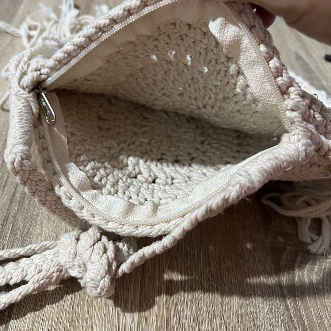 Bali Boho Macrame Crochet Round Sling Bag with Tassels (Category: Beach Bags) located in Pasay City. Submitted by leagn_07 (Listing ID 1446498117, Image 2). Description: - Adorable round crochet bag - Cream/off-white color - Zipper closure - Stylish tassel fringe detail - Matching crocheted strap - Perfect for boho or festival outfits - Bought in Bali - Barely used/Just stored.