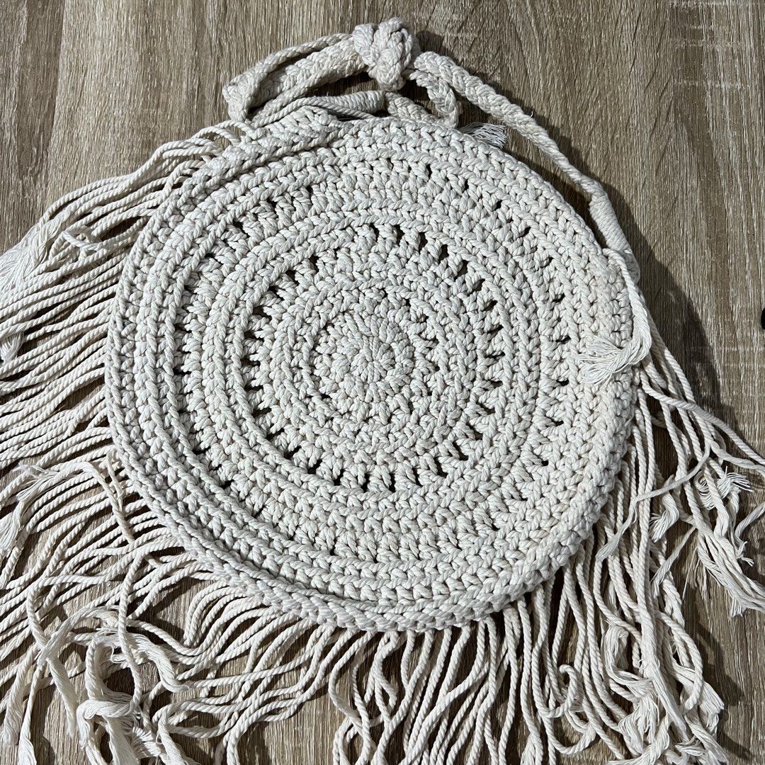 Bali Boho Macrame Crochet Round Sling Bag with Tassels (Category: Beach Bags) located in Pasay City. Submitted by leagn_07 (Listing ID 1446498117, Image 1). Description: - Adorable round crochet bag - Cream/off-white color - Zipper closure - Stylish tassel fringe detail - Matching crocheted strap - Perfect for boho or festival outfits - Bought in Bali - Barely used/Just stored.