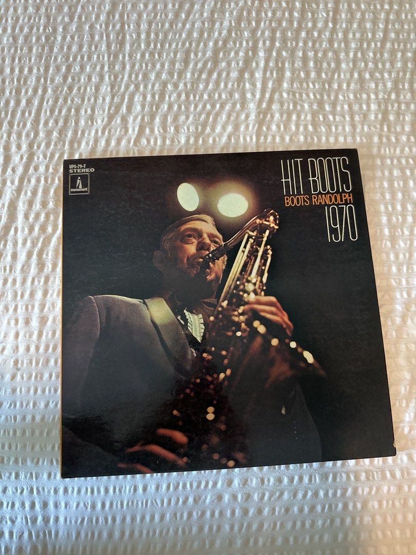 Boots Randolph Hit Boots 1970 Vinyl Record (Category: Vinyls) located in Manila. Submitted by el_decluttering (Listing ID 1446430098, Image 1). Description: - Boots Randolph - Hit Boots Album (1970) - Record Label: RCA Victor Records - Genre: Classic Jazz - Features Boots Randolph playing the saxophone on the cover. - Tracklist available on the back cover..
