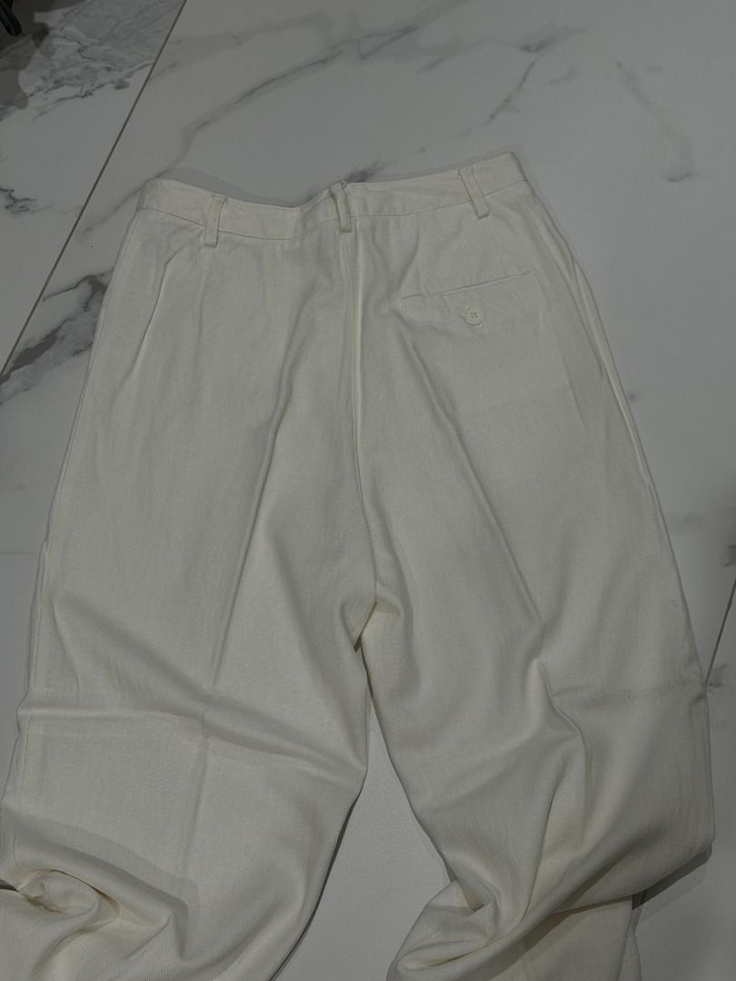 Brandy Melville Linen White Trousers (Category: Other Bottoms) located in Mandaluyong City. Submitted by kayechx (Listing ID 1446496136, Image 3). Description: - White Brandy Melville trousers - High-waisted fit - Pleated front detail - Classic straight leg - Button and zip closure - Two back pockets - Versatile for any occasion - price SLIGHTLY negotiable, but not by a lot huhu already selling cheap since i need closet space asap will give 10% d