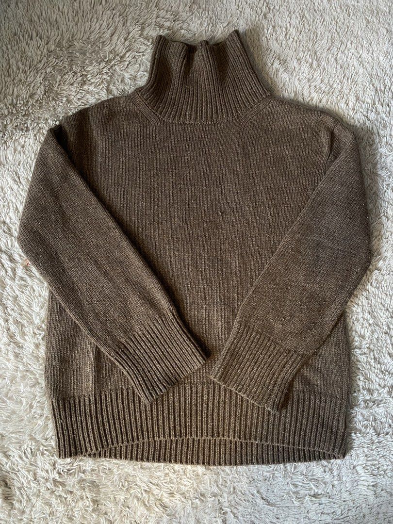 Brown Knit Turtleneck Sweater From JAPAN (Category: Longsleeves) located in Cabuyao City. Submitted by getvintage (Listing ID 1446404109, Image 1). Description: - Cozy brown knit turtleneck sweater - Features ribbed cuffs and hem - Versatile for layering or standalone wear - Measurements: Pit to pit approx. 19 inches, Length approx. 25 inches - Ideal for cooler weather.