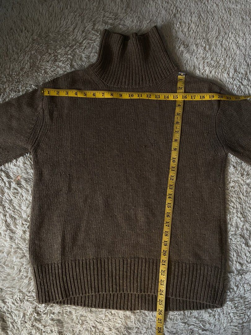 Brown Knit Turtleneck Sweater From JAPAN (Category: Longsleeves) located in Cabuyao City. Submitted by getvintage (Listing ID 1446404109, Image 2). Description: - Cozy brown knit turtleneck sweater - Features ribbed cuffs and hem - Versatile for layering or standalone wear - Measurements: Pit to pit approx. 19 inches, Length approx. 25 inches - Ideal for cooler weather.