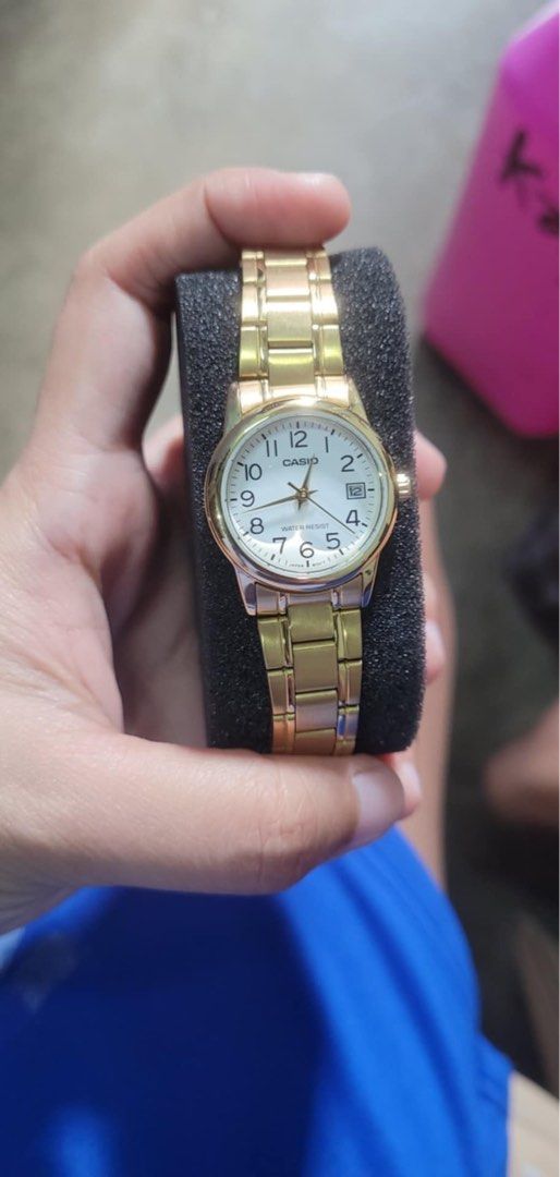Casio Gold Tone Water Resist Watch (Category: Women's Watches) located in Manila. Submitted by jemiang05 (Listing ID 1446442420, Image 1). Description: - Gold tone Casio watch - Classic white dial with clear hour markers - Water resistant function - Durable metal strap - Ideal for everyday wear - In perfect working condition.