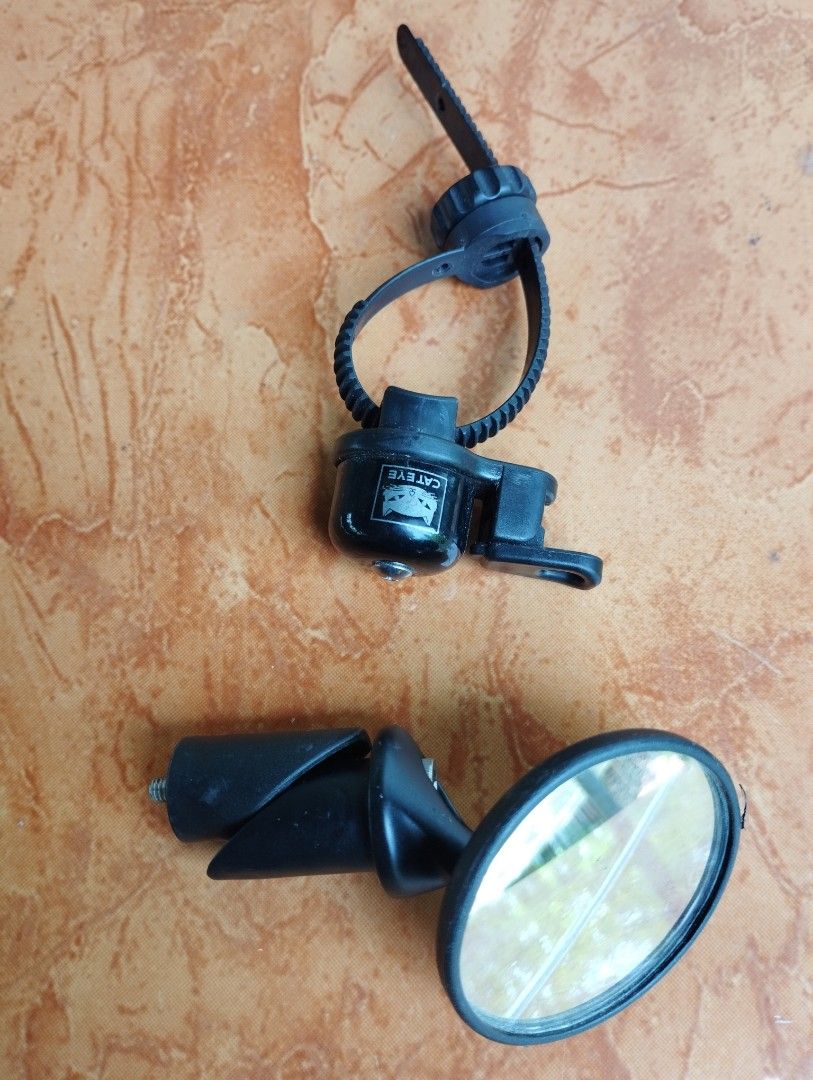 Cateye Side Mirror and Bell (Category: Bicycles) located in San Fernando. Submitted by nerosales (Listing ID 1446369317, Image 1). Description: Selling as SET CATEYE Side Mirror, bar end mount (straight or drop bar pwede) CATEYE Bell 300 pesos only SM City Pampanga Shipping: J&T Payment: Gcash NO COD / NO COP.
