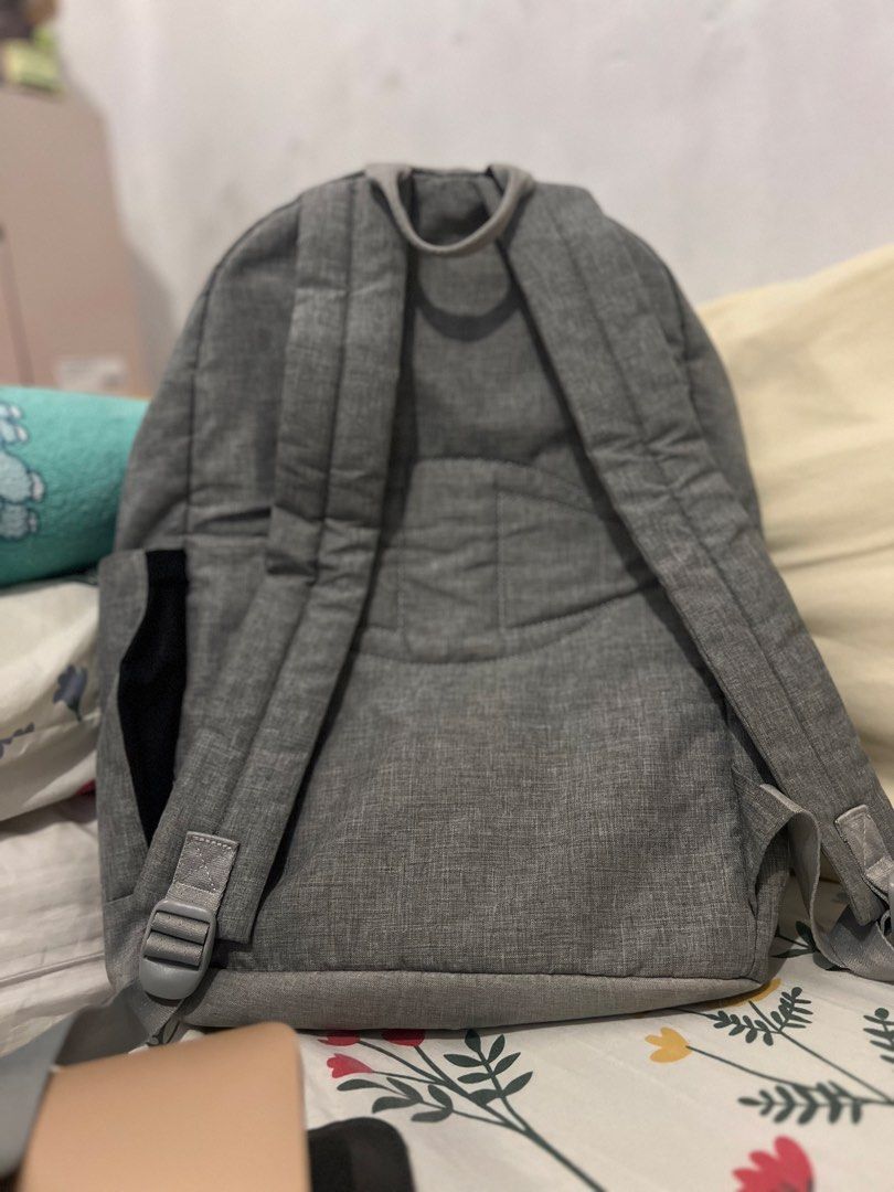 Champion Grey Backpack with Rainbow Accents (Category: Backpacks) located in Pasig City. Submitted by pabsssssssssss (Listing ID 1446442516, Image 3). Description: -Classic Grey Champion backpack (FIXED PRICE) - Features iconic colorful embroidered Champion logo - Stylish rainbow stripe detail along the zipper - Two spacious main compartments - Convenient side pockets for extra storage - Adjustable padded straps for maximum comfort - Ideal for sc