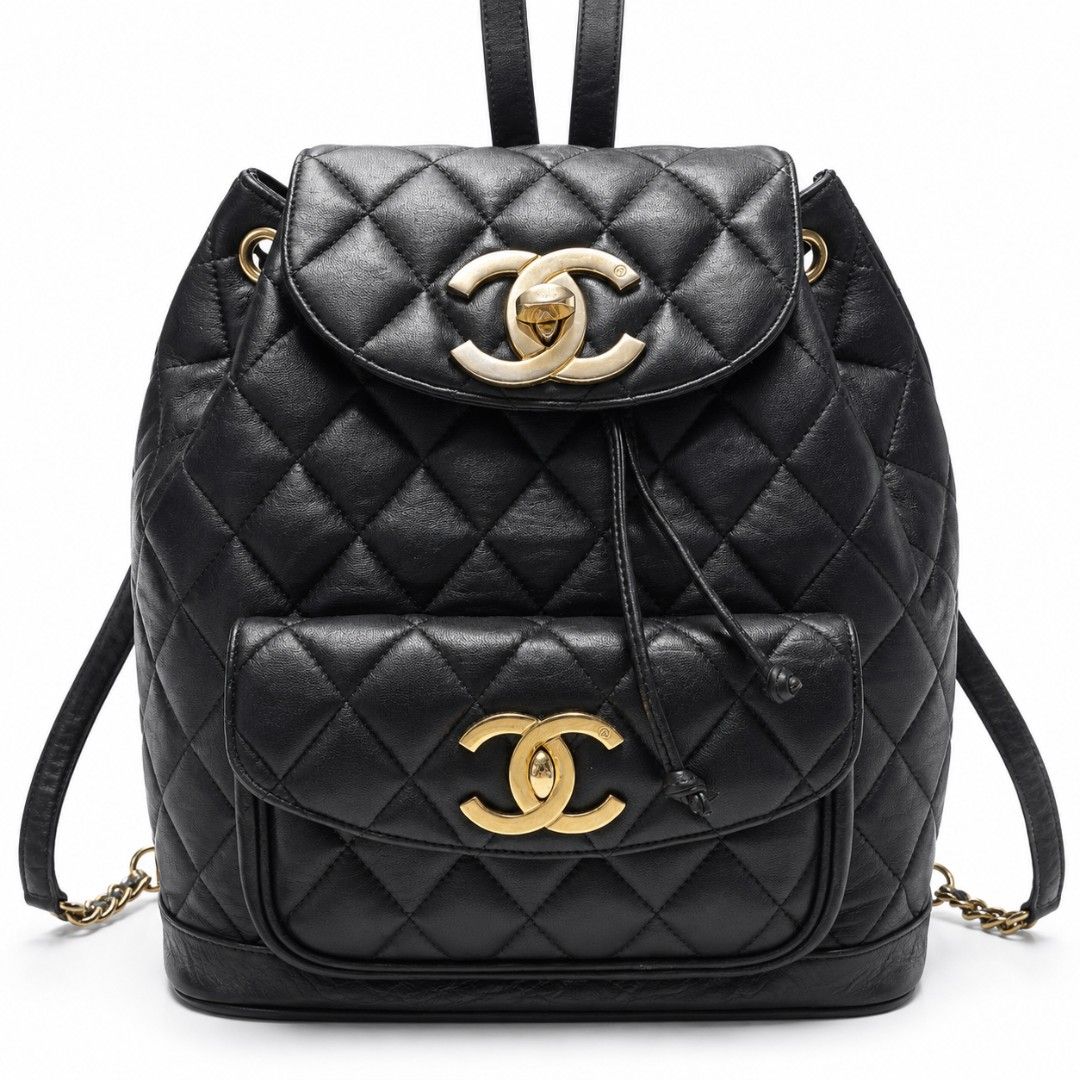 Chanel Black Quilted Leather Backpack Gold CC Logo (Category: Backpacks) located in Manila. Submitted by mystar0411 (Listing ID 1446380567, Image 1). Description: - Classic Chanel backpack - Black quilted leather - Gold hardware - Iconic CC logo on front flap - Front pocket - Drawstring closure - Chain straps - Ideal for everyday use or travel.