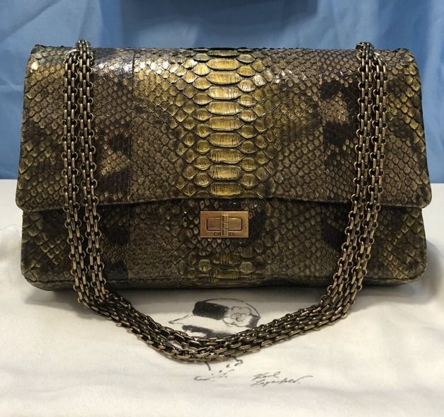 Chanel Limited Gold Python 226 Classic Reissue 2.55 Flap Bag - Jumbo (Category: Luxury Bags & Wallets) located in Quezon City. Submitted by mamaloveaminah (Listing ID 1446495506, Image 1). Description: - Chanel Limited Gold Python 226 Classic Reissue 2.55 Flap Bag - Jumbo - Dimensions (W × H × D) : 28 × 18 × 8 cm - Leather: Metallic Gold Python (Exotic) - Size 226 - Jumbo - Serial: 15531178 - Collection/Series: 15 - Production year: 2011 - "CHANE