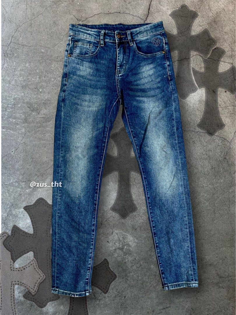 Chrome Hearts Denim Jeans (Category: Jeans) located in Makati City. Submitted by zus_tht (Listing ID 1446387091, Image 2). Description: - Blue wash denim jeans - Iconic Chrome Hearts logo on back pocket - Smaller Chrome Hearts logo on front coin pocket - Leather patch at back waistband - Classic five-pocket styling - Button and zip fly closure SIZE: 28 on tag BOOTLEG.