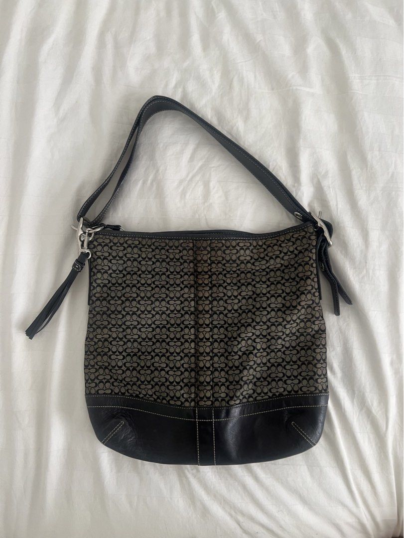 Coach signature jacquard bag (Category: Shoulder Bags) located in Davao. Submitted by kindred.declutter (Listing ID 1446389496, Image 1). Description: Vintage Coach signature jacquard two-way shoulder and crossbody bag. Canvas body, black leather strap and base, silver hardware. In such a good condition. Price still negotiable. .