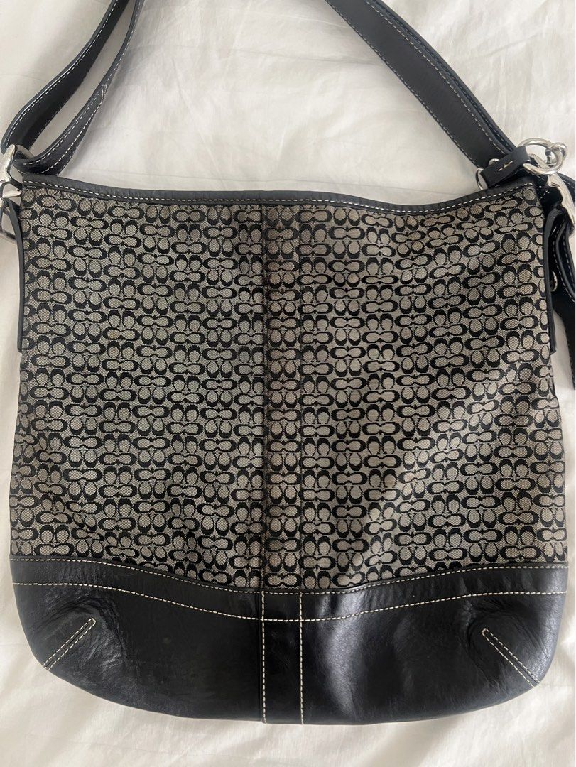Coach signature jacquard bag (Category: Shoulder Bags) located in Davao. Submitted by kindred.declutter (Listing ID 1446389496, Image 2). Description: Vintage Coach signature jacquard two-way shoulder and crossbody bag. Canvas body, black leather strap and base, silver hardware. In such a good condition. Price still negotiable. .