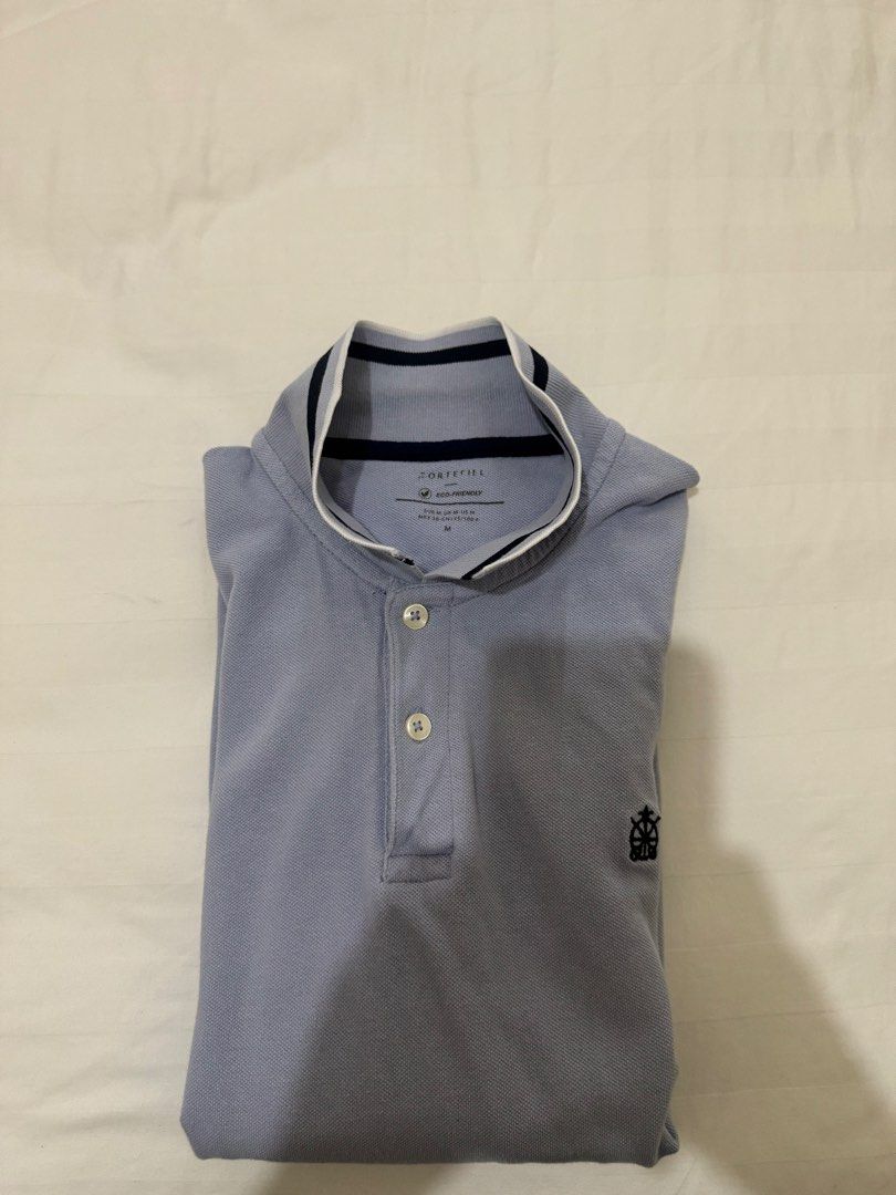 Cortefiel Light Blue Polo Shirt (Category: Tshirts & Polo Shirts ) located in Manila. Submitted by pjguillermo (Listing ID 1446382769, Image 1). Description: - Polo Shirt - Light Blue Color - Embroidered Brand Logo on Chest - Button-Up Neckline - Contrasting Collar and Sleeve Trim - Short Sleeves - Ideal for Casual Wear.