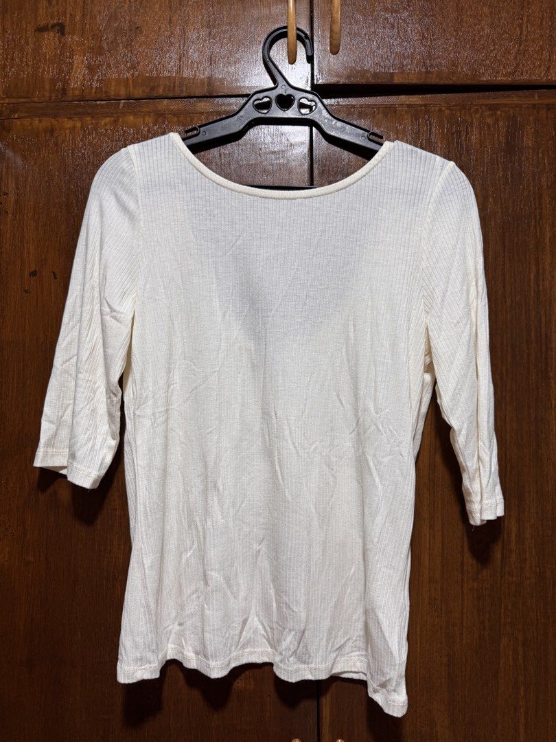 Cream Ribbed 3/4 Sleeve Top (Category: Blouses) located in Quezon City. Submitted by KK_declutterluxx (Listing ID 1446444512, Image 1). Description: - Cream colored top - Ribbed texture - 3/4 length sleeves - low back - Simple and versatile - Great for layering or wearing on its own - stretch - best fir medium to large frame lng Sf c/o buyer.