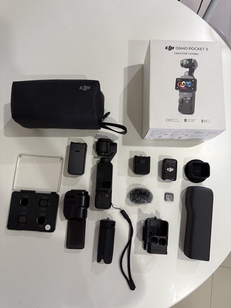 DJI Osmo Pocket 3 Creator Combo with Accessories (Category: Cameras) located in Subic. Submitted by jamstareu (Listing ID 1446514848, Image 1). Description: NO ISSUE. NO SCRATCH [LADY OWNED] with accessories. DJI Osmo Pocket 3 Creator Combo - All items shown in photos - Ideal for vlogging and content creation - Open for Swap (Insta360 Go ultra) RFS: upgrade.