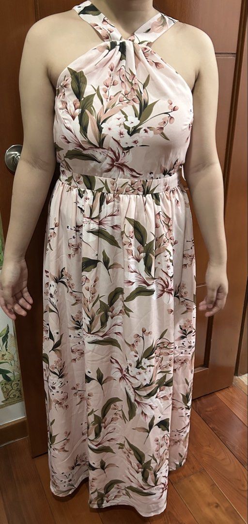 Floral Halter Tie Neck Backless Dress (Category: Dresses) located in Quezon City. Submitted by bettinaaaa (Listing ID 1446481141, Image 2). Description: In excellent condition No stains or issues .
