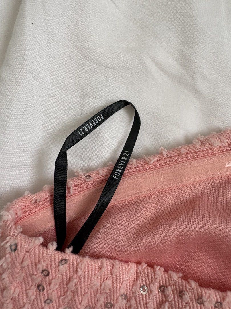 Forever 21 Pink Sequin Strapless Corset Top Size S (Category: Others Tops) located in Taguig. Submitted by cftbncs (Listing ID 1446399218, Image 3). Description: - Forever 21 pink strapless top - Covered in sparkly sequins - Zipper closure at the back - Lined inside - Perfect for parties or a night out - Size S.