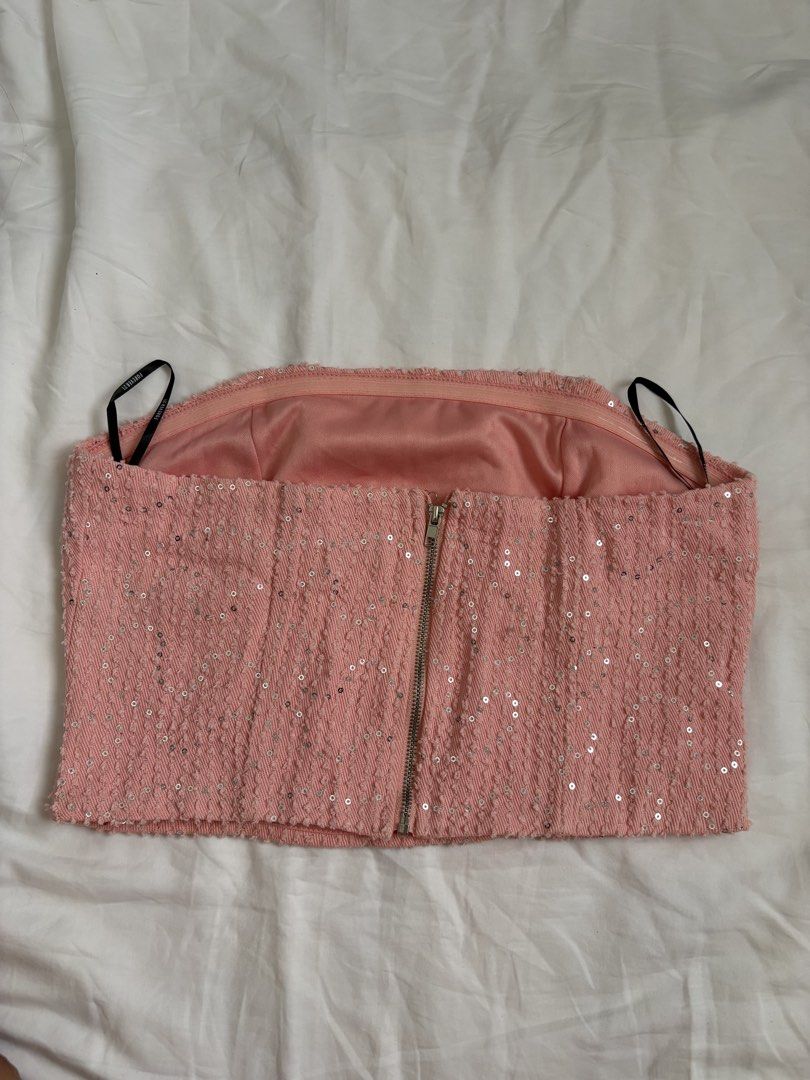 Forever 21 Pink Sequin Strapless Corset Top Size S (Category: Others Tops) located in Taguig. Submitted by cftbncs (Listing ID 1446399218, Image 2). Description: - Forever 21 pink strapless top - Covered in sparkly sequins - Zipper closure at the back - Lined inside - Perfect for parties or a night out - Size S.