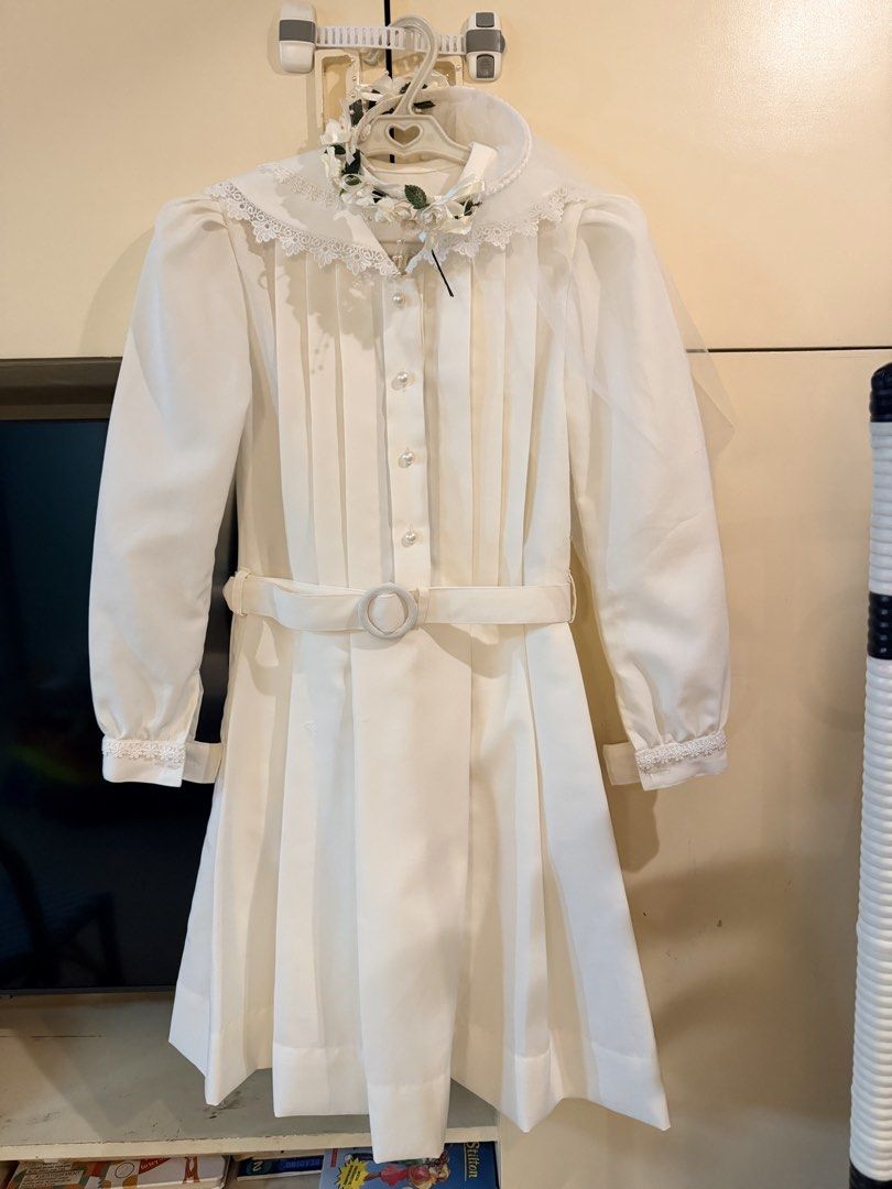 Gala Uniform (St Scho) for First Holy Communion (Category: Dresses) located in Pasay City. Submitted by marge.chang (Listing ID 1446532118, Image 1). Description: GALA UNIFORM USED ONLY FOR FIRST HOLY COMMUNION AT ST SCHO -Beautiful white formal dress perfect for special events. - Elegant pleated front design. - Long sleeves with delicate lace trim. - Comes with a matching belt to cinch the waist. - Includes a lovely floral headband. - Approximat