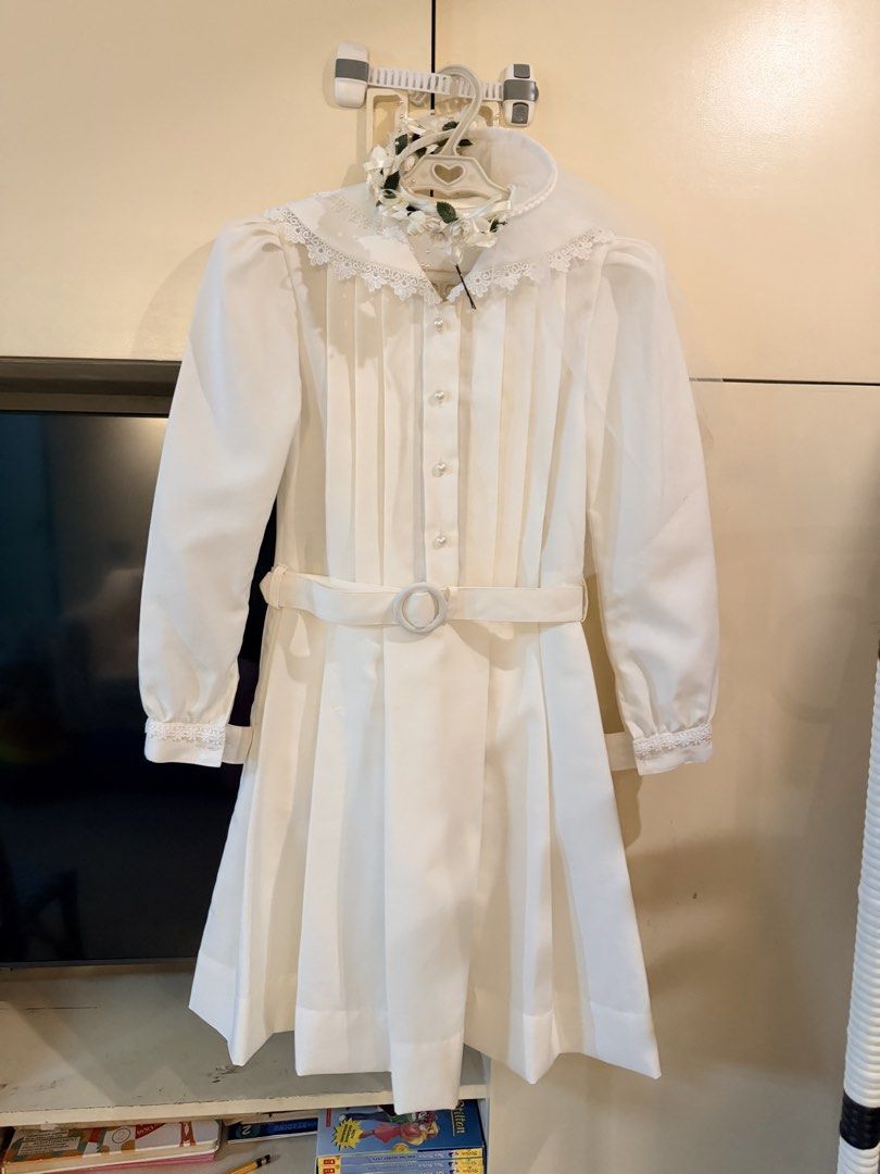 Gala Uniform (St Scho) for First Holy Communion (Category: Dresses) located in Pasay City. Submitted by marge.chang (Listing ID 1446532118, Image 2). Description: GALA UNIFORM USED ONLY FOR FIRST HOLY COMMUNION AT ST SCHO -Beautiful white formal dress perfect for special events. - Elegant pleated front design. - Long sleeves with delicate lace trim. - Comes with a matching belt to cinch the waist. - Includes a lovely floral headband. - Approximat