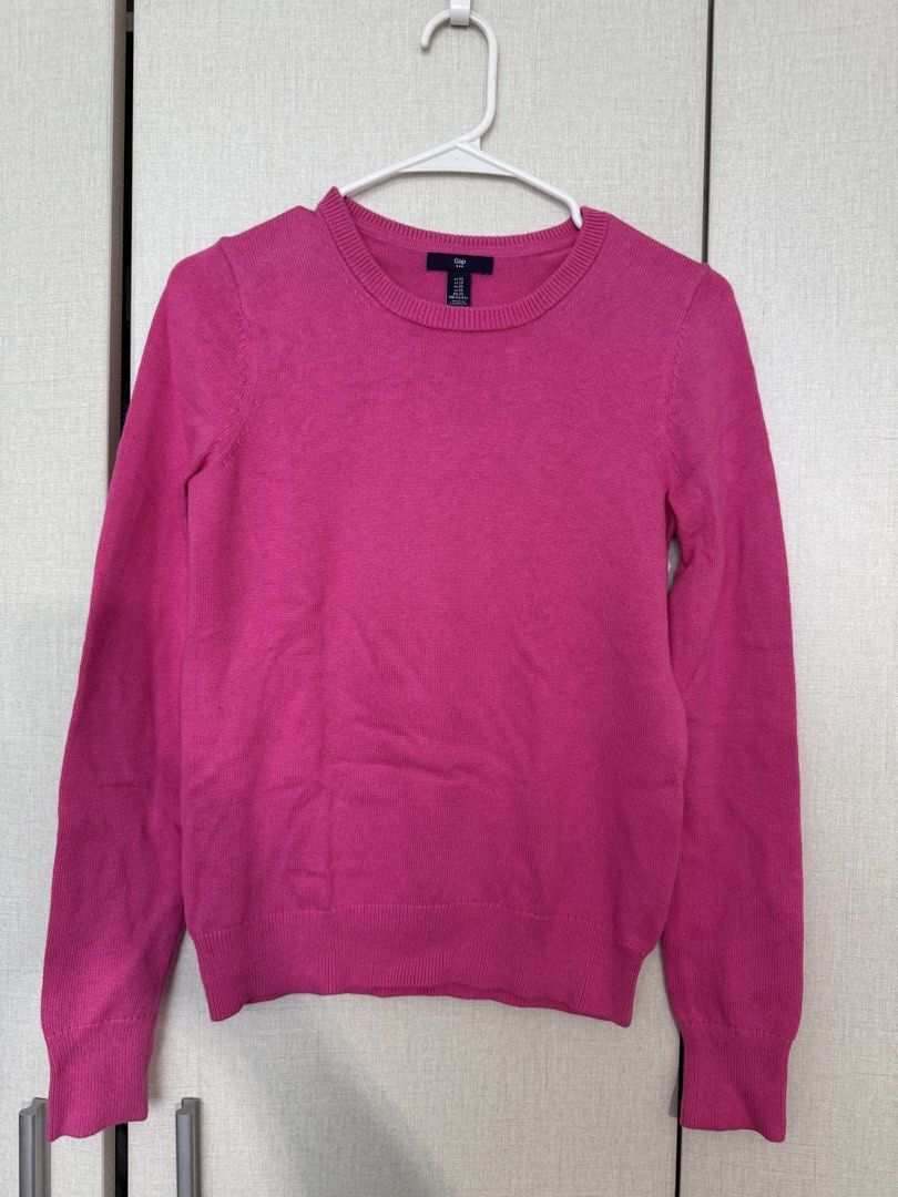 Gap Pink Crewneck Sweater XS (Category: Longsleeves) located in Quezon City. Submitted by kcapi (Listing ID 1446403756, Image 1). Description: - Pink Gap crewneck sweater - Long sleeves with ribbed cuffs - Ribbed hem and neckline - Soft and comfortable knit fabric - Made in Cambodia - Ideal for layering or standalone wear.