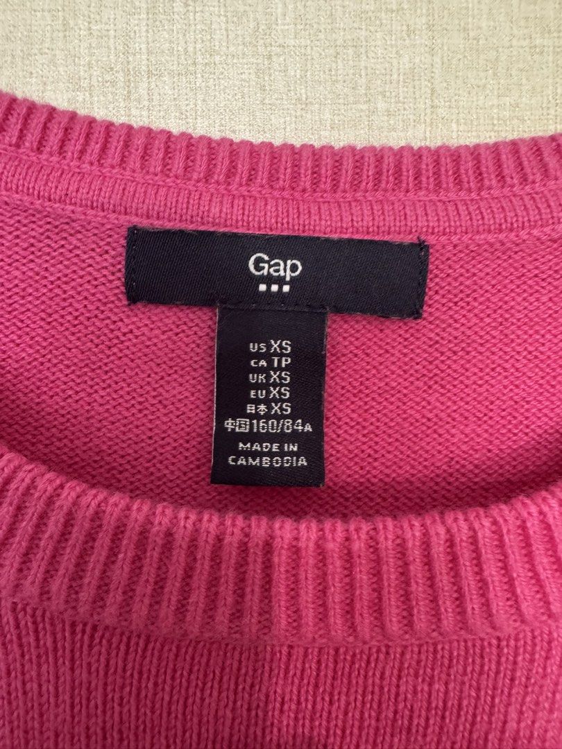 Gap Pink Crewneck Sweater XS (Category: Longsleeves) located in Quezon City. Submitted by kcapi (Listing ID 1446403756, Image 2). Description: - Pink Gap crewneck sweater - Long sleeves with ribbed cuffs - Ribbed hem and neckline - Soft and comfortable knit fabric - Made in Cambodia - Ideal for layering or standalone wear.