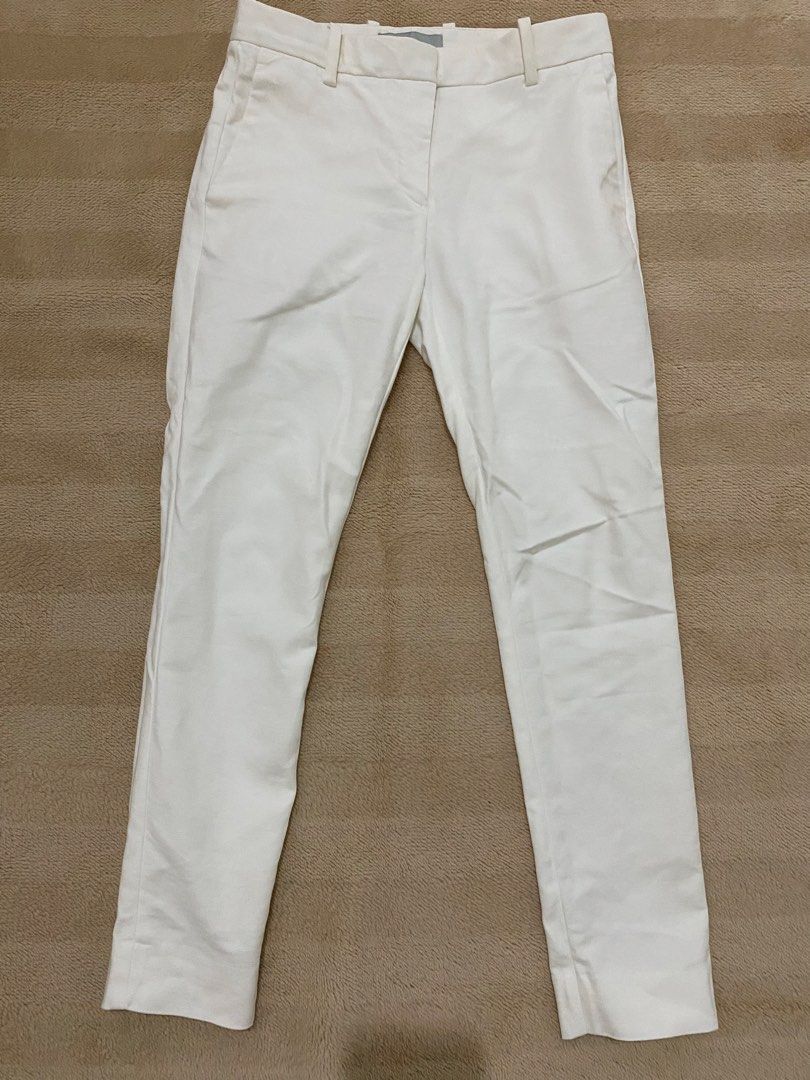 Gap Slim Cropped White Pants (Category: Jeans) located in Tacurong. Submitted by phthriftclothing (Listing ID 1446470940, Image 1). Description: - Brand: Gap - Color: White - Style: Slim cropped pants - Fit: Comfortable - Versatility: Great for dressing up or down, suitable for work or casual outings - Pairing: Easy to match with any top - 24 - 24.