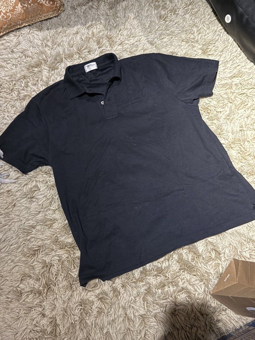 Giordano The Dry Polo (Category: Tshirts & Polo Shirts ) located in Manila. Submitted by kyle.daniel (Listing ID 1446468092, Image 1). Description: - Giordano - Black - Size on tag: XXL, fits Medium to Large - Style: Short sleeve polo shirt with collar and button placket - Features: Simple, classic design, breathable fabric - Ideal for: Casual wear, sports, everyday activities.