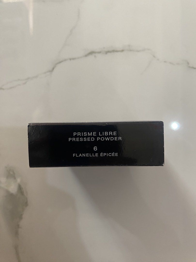 Givenchy Prisme Libre Pressed Powder - Shade 6 Flanele Epicee (Category: Makeup) located in Makati City. Submitted by jspmcl (Listing ID 1446406186, Image 2). Description: - Givenchy Prisme Libre Pressed Powder - Shade: 6, Flanele Epicee - Finish: Mattifying and blurring - Benefits: Creates a unified, blurred, matte, and radiant complexion - Texture: Ultra-silky and weightless - Coverage: Sheer correction - Oil Control: Controls shine - Applicati
