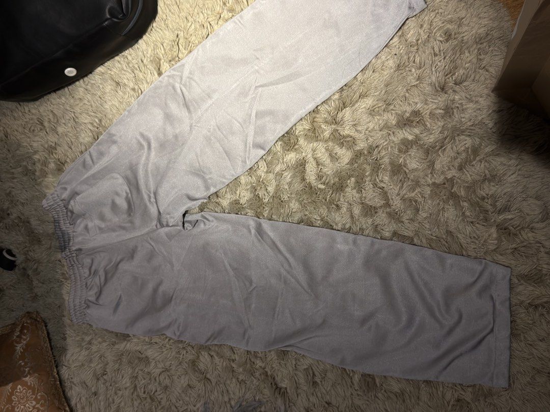 Grey Track Pants with White Lace Stripes (Category: Joggers) located in Manila. Submitted by kyle.daniel (Listing ID 1446464934, Image 2). Description: - Grey track pants - Striped with a subtle lace-like pattern - Comfortable elastic waistband - Ideal for lounging or casual wear - Versatile and easy to pair with any top - No issue.