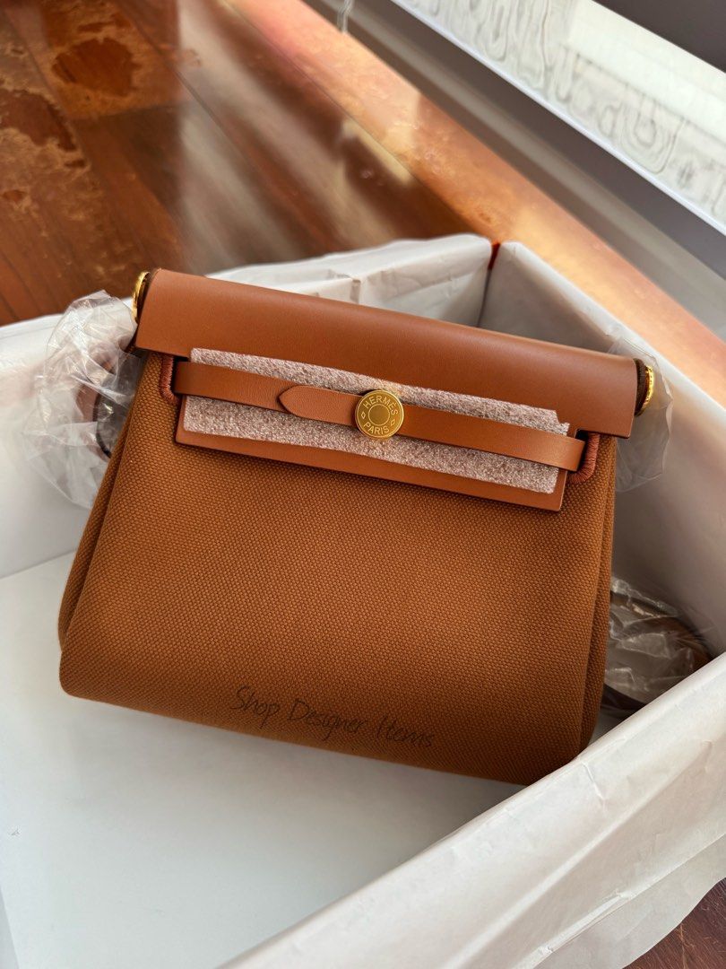 Hermes Mini Herbag Fauve GHW (Category: Luxury Bags & Wallets) located in Quezon City. Submitted by shopdesigneritems (Listing ID 1446513249, Image 1). Description: 100% Authentic Brand New Color: Fauve Gold Hardware Toile Leather Stamp G Comes with Hermes box, dustbag, care booklet, receipt For inquiries: +639053333168 Email: shopdesigneritems@yahoo.com IG: shopdesigneritems.