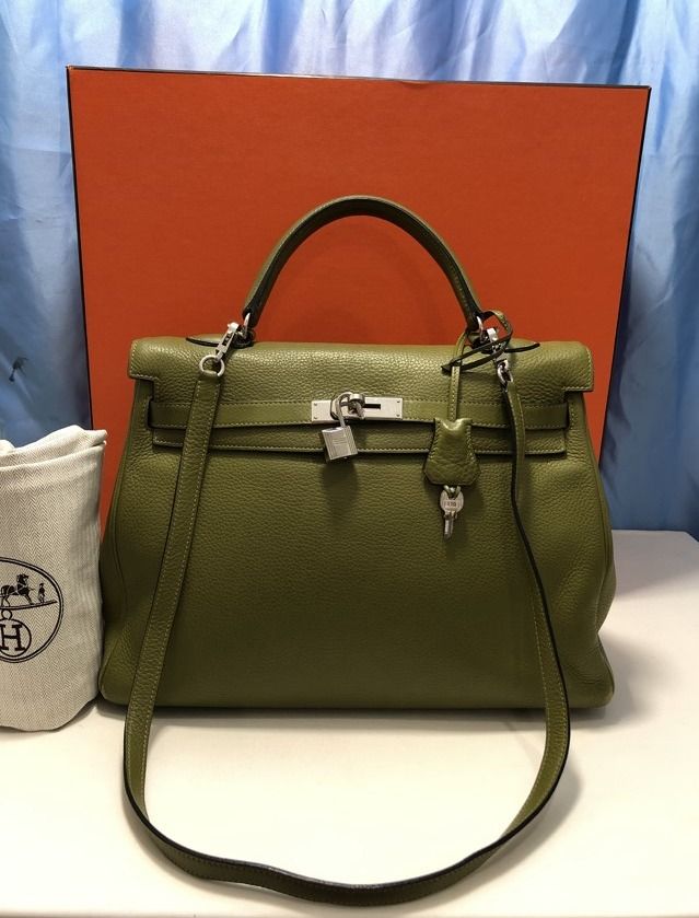 Hermès Kelly Retourne 32 - PHW (Category: Luxury Bags & Wallets) located in Quezon City. Submitted by mamaloveaminah (Listing ID 1446501693, Image 1). Description: - Hermès Kelly Bag - Retourne - Size 32 - Measurements App : 32 x 23 x 10.5 cm - Heat stamp: [L] N28 - Hermes Year Stamp [L] : (2008) - Color : Anis green/Vert anis - Material : Togo leather - Hardware : Silver - turn lock closure and functional padlock - Accessory included Original Sh