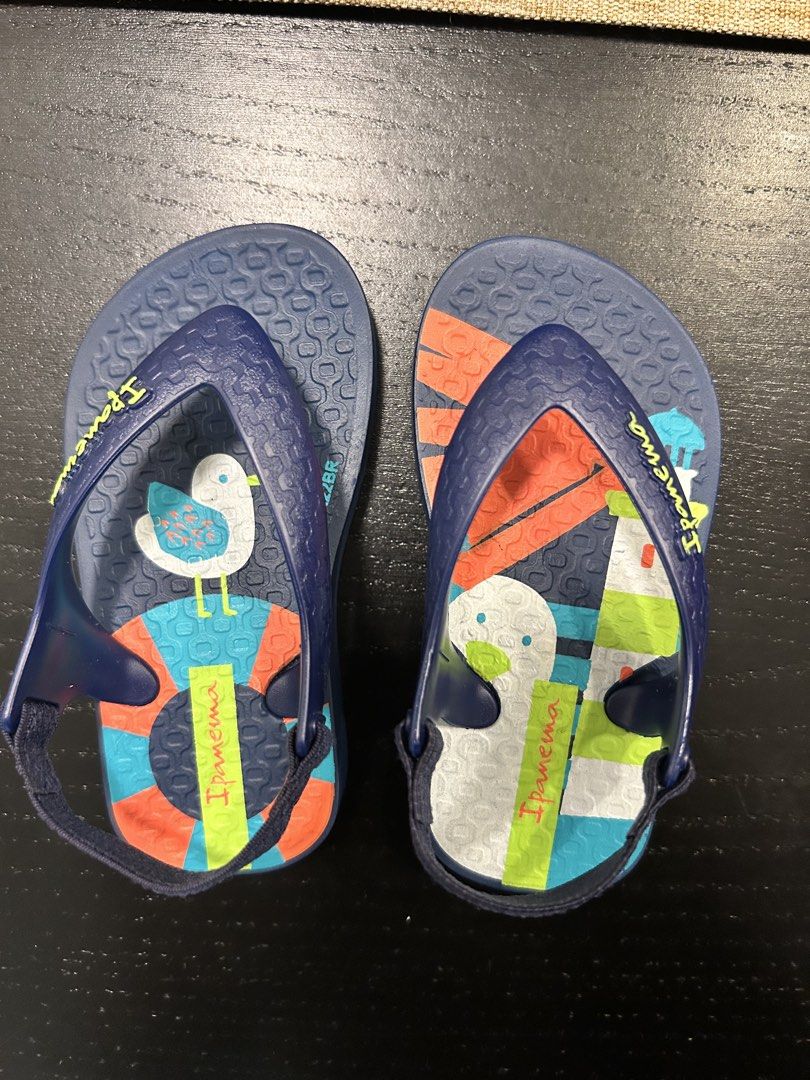 Ipanema Kids Navy Blue Flip Flops with Seagull & Duck Design (Category: Babies & Kids Fashion) located in Kuala Lumpur. Submitted by dddin18 (Listing ID 1446381106, Image 1). Description: - Cute navy blue Ipanema flip flops - Features a fun seagull and duck design with colorful accents - Easy slingback strap for a secure fit - Great for beach days or casual wear - Made in Brazil Ipanema Baby Flip Flops (Original) – EU 17/18 Original Ipanema baby 