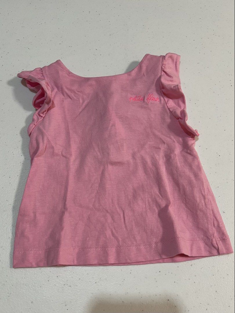 Jacadi Paris Pink Ruffle Sleeve Top 18M (Category: Babies & Kids Fashion) located in San Juan City. Submitted by smjose (Listing ID 1446476967, Image 1). Description: - Adorable pink top from Jacadi Paris - Features cute ruffle details on short sleeves - Small embroidered detail on the front - Convenient snaps at the shoulder for easy dressing - Made in Madagascar - Comfortable cotton blend material.