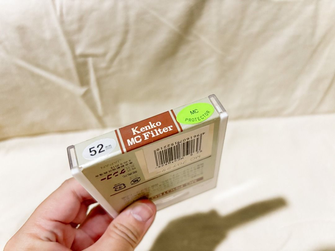 Kenko Lens Filter MC Protector (for 52mm Nikon Lens with case) (Category: Lens & Kits) located in Manila. Submitted by cupboard.underthestairs (Listing ID 1446433385, Image 2). Description: • Bought in Japan for ₱ 1100 (originally for our 52mm Nikon Lens • Brand is Kenko • Brand new, sealed and unused, never taken out of the hard case as shown on photos • Please check if your lens is compatible with this filter. For 52mm lens only. We will not be