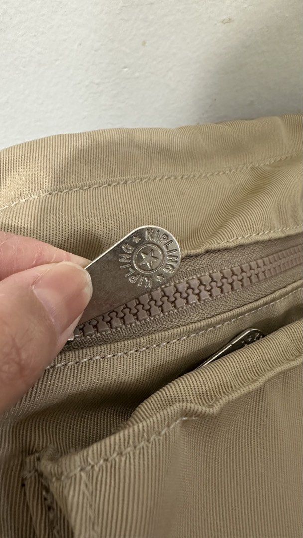 Kipling Crossbody abag (Category: Cross-body Bags) located in Manila. Submitted by vrnykshv (Listing ID 1446475849, Image 3). Description: used mga five times lang during travel abroad may minimal stain sa ilalim which i think is washable naman not using it anymore Location: Makati.