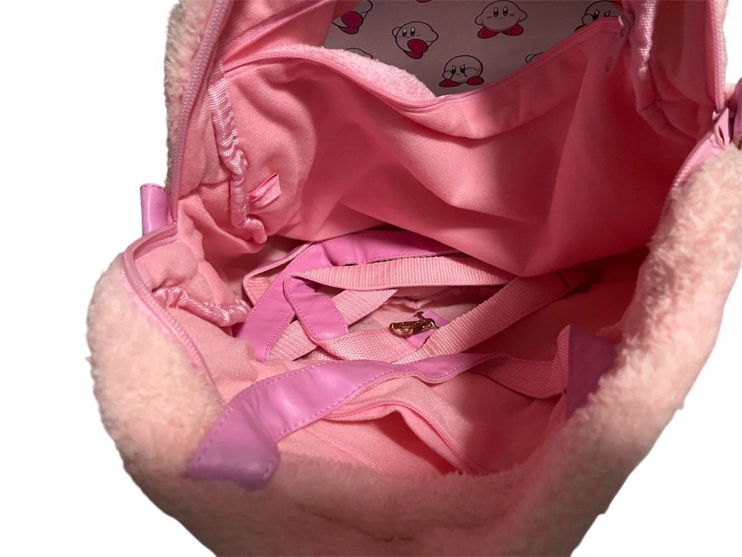 Nintendo Kirby Sling Bag - (see through pocket) (Category: Sling Bags) located in General Trias. Submitted by aizapandecluttershop (Listing ID 1446532943, Image 3). Description: Used 1 lang po, from japan.. super cute nya.. see through pocket.. Madami kayo pwede ilagay.. may sling po sya...