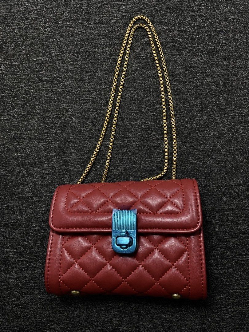 Lambskin Red Bag (Category: Shoulder Bags) located in Muntinlupa City. Submitted by allychino (Listing ID 1446375643, Image 1). Description: Brandnew Size: Small With gold hardware Loc: Tunasan, Muntinlupa City.