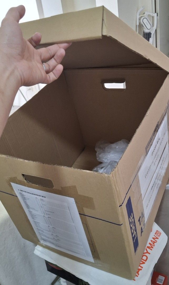 Large Cardboard Storage Box - Premium Box (Category: Storage Boxes & Baskets) located in Binan City. Submitted by ot3p0g1 (Listing ID 1446469185, Image 1). Description: - Large, sturdy cardboard storage box - Ideal for moving or long-term storage - Features convenient built-in handles - Premium quality for reliable use - Used only once during wedding - 4 units available (100 each or negotiable for take all) - Will give 1 free medium box if will g