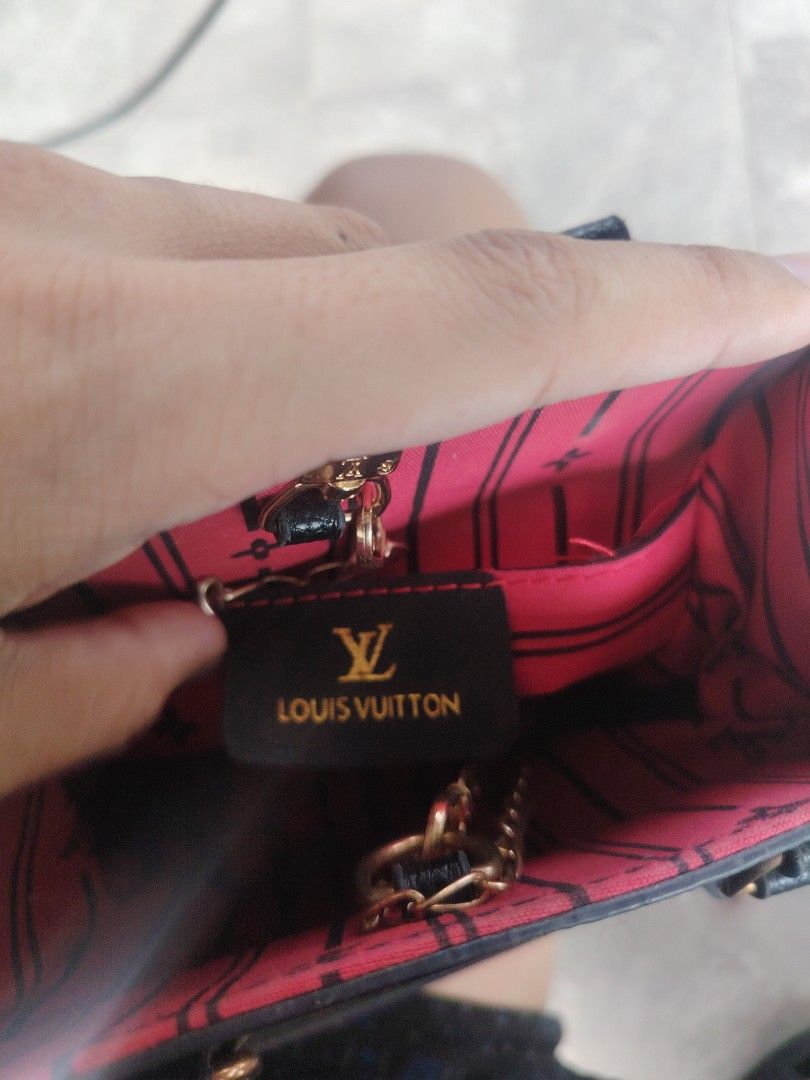 Louis Vuitton Black Monogram Textured Handbag (Category: Luxury Bags & Wallets) located in Dasmarinas. Submitted by clydegallo40531 (Listing ID 1446366534, Image 2). Description: - Iconic textured monogram pattern - Vibrant red interior lining - Elegant gold hardware details - Comfortable top handles - Versatile for everyday or special events - A timeless, classic piece -300 plus sf.