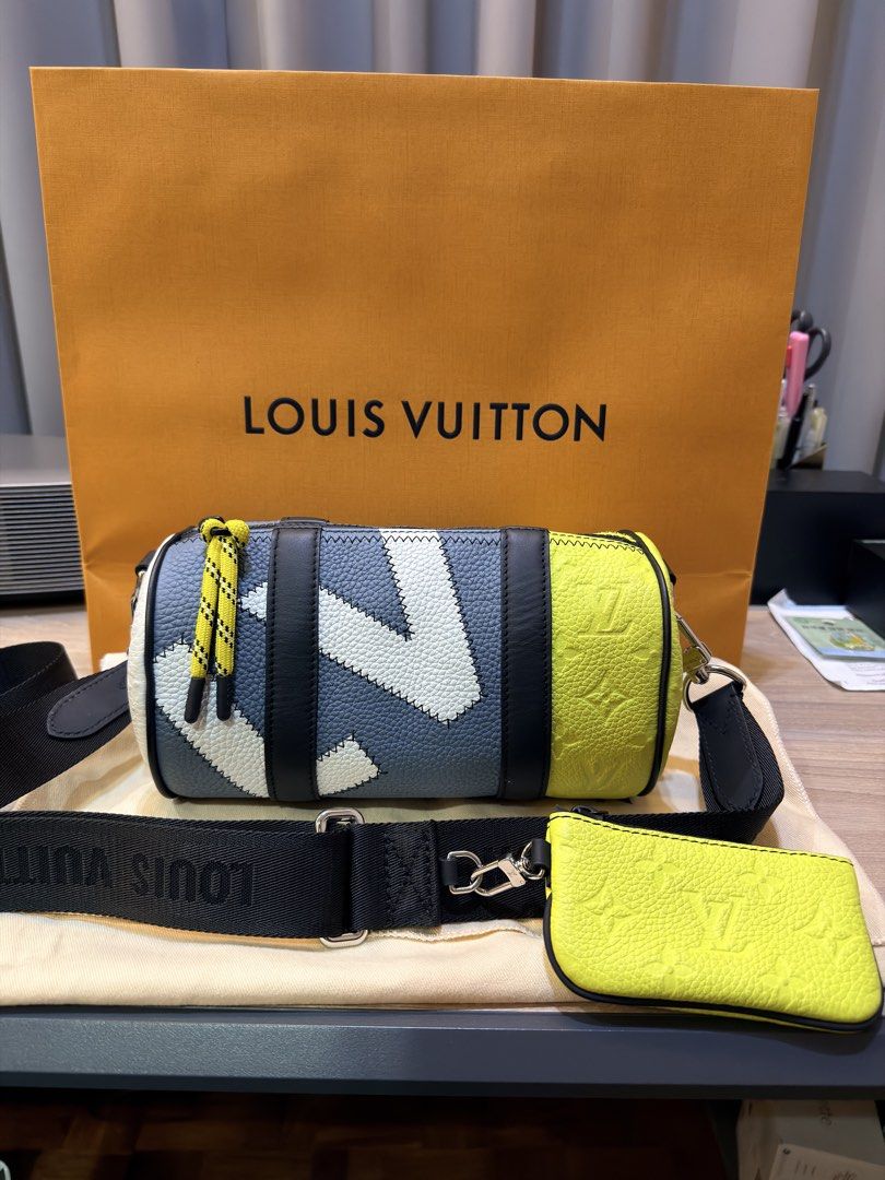(AUTH) LOUIS VUITTON Limited Ed. Keepall XS Monogram Multicolor Bag (Category: Luxury Bags & Wallets) located in Pasig City. Submitted by theclosetcasemanila (Listing ID 1446515020, Image 3). Description: - Guaranteed Authentic - Purchased in Japan - Microchipped - Genuine calfskin leather (not canvas) - Limited edition. Cannot find this anymore!! - Louis Vuitton Keepall XS Bag - Includes matching neon yellow pouch - Iconic monogram pattern - Adj