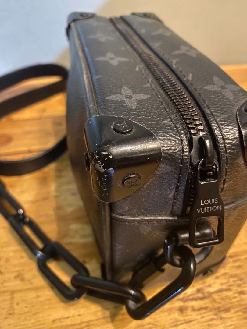 Louis Vuitton Monogram Eclipse Canvas Soft Trunk Mini Bag (Category: Luxury Bags & Wallets) located in Cagayan de Oro. Submitted by timeless.ph (Listing ID 1446511384, Image 3). Description: Size: S Width: 8 Length: 5 Color rate: 9.8/10 Condition: RANK B Issue: Dents, missing 1 screw, minor rub.