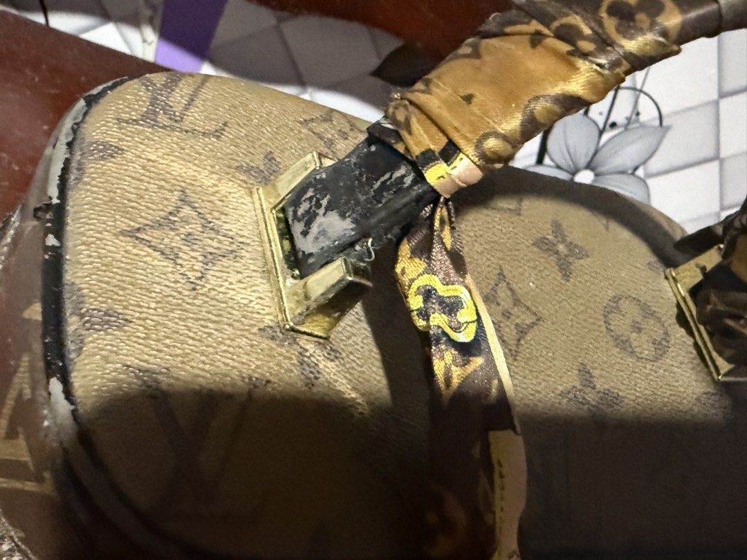 Louis Vuitton Monogram Vanity Case with Scarf Handle Wrap (Category: Luxury Bags & Wallets) located in Manila. Submitted by devorahlop39116 (Listing ID 1446374807, Image 3). Description: - Classic Louis Vuitton monogram vanity case - Features a top handle wrapped with a silk scarf - Secure zipper closure - Interior includes a main compartment and a smaller section - Minor signs of wear on the handle and edges - Ideal for travel or everyday use Wi
