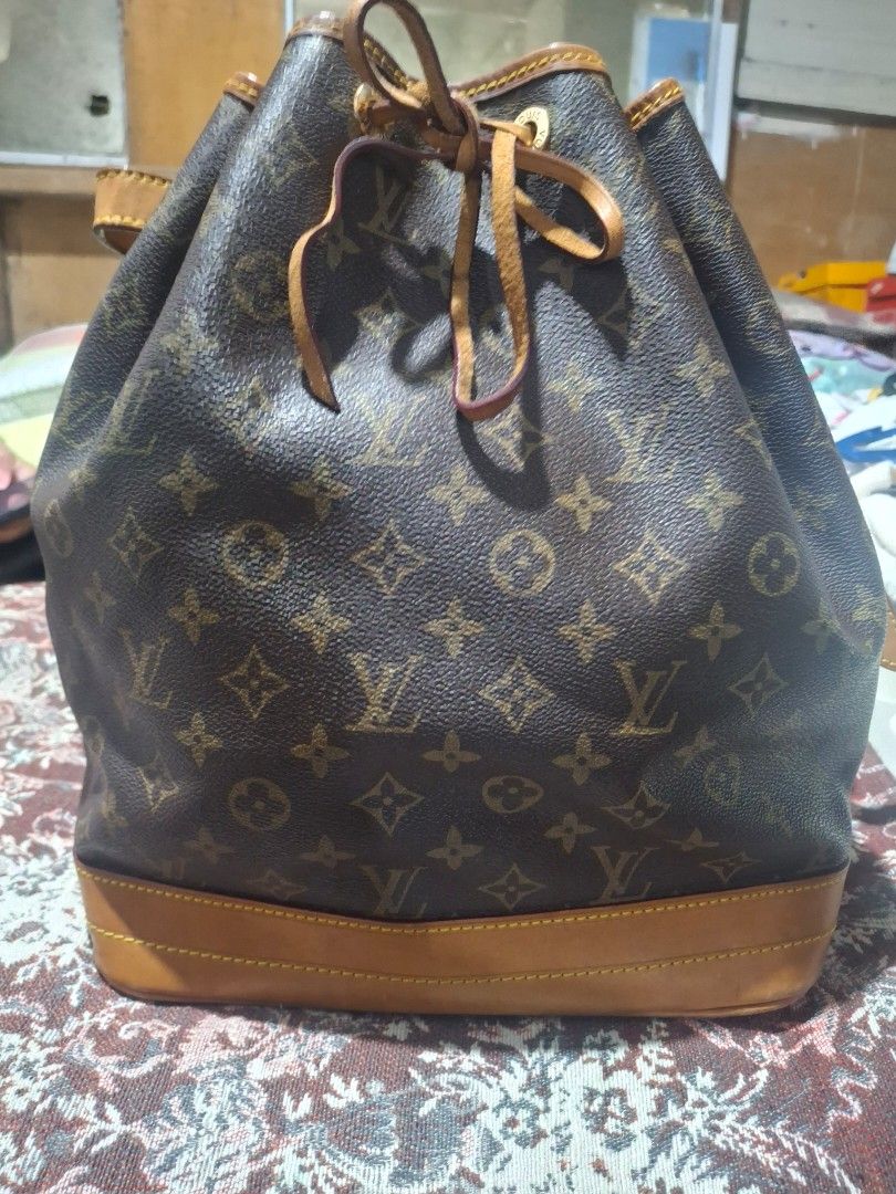 10:10 SALE Louis Vuitton Noe GM (Category: Luxury Bags & Wallets) located in Lipa City. Submitted by kathethings (Listing ID 1446403476, Image 2). Description: Authenticity not Guaranteed No Refund , No Exchange Buy at you own Risk Japan Pre-owned - Classic Louis Vuitton bucket bag - Monogram canvas with leather trim and straps - Secure drawstring closure - Shows some signs of wear on leather and canvas - Interior is clean - Timeless and iconic p