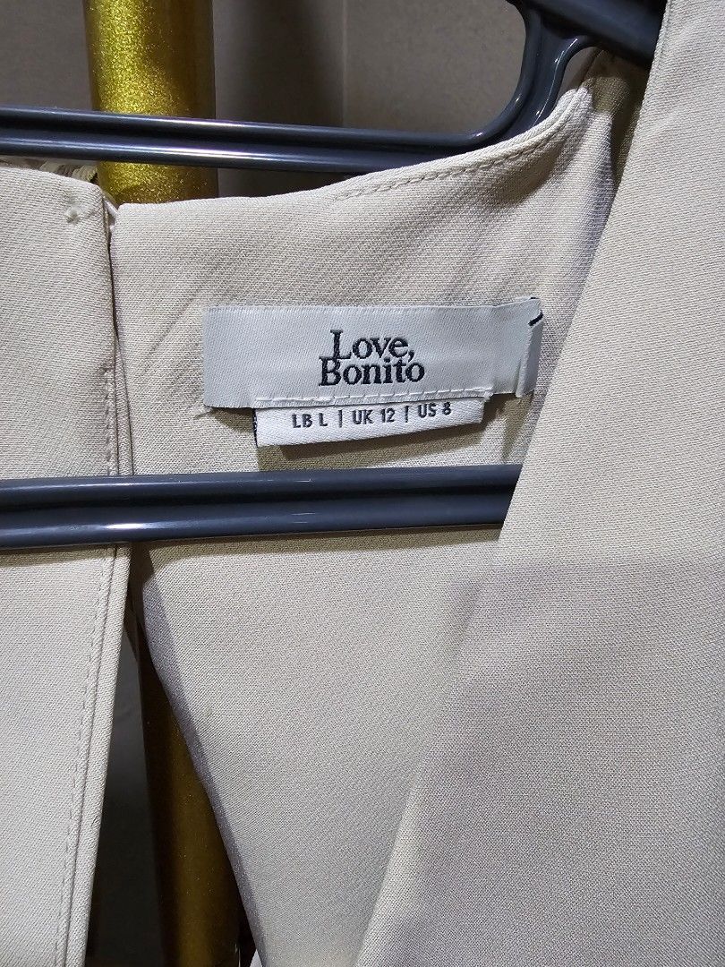 Love, Bonito Beige Jumpsuit Size L (Category: Dresses) located in Paranaque City. Submitted by laraaa_csf (Listing ID 1446390389, Image 3). Description: - Beige jumpsuit from Love, Bonito - Size L - Features a flattering tie waist detail - Made from good quality material - Used once only for pictorial - Versatile: great for events or work - Kept in closet after using.