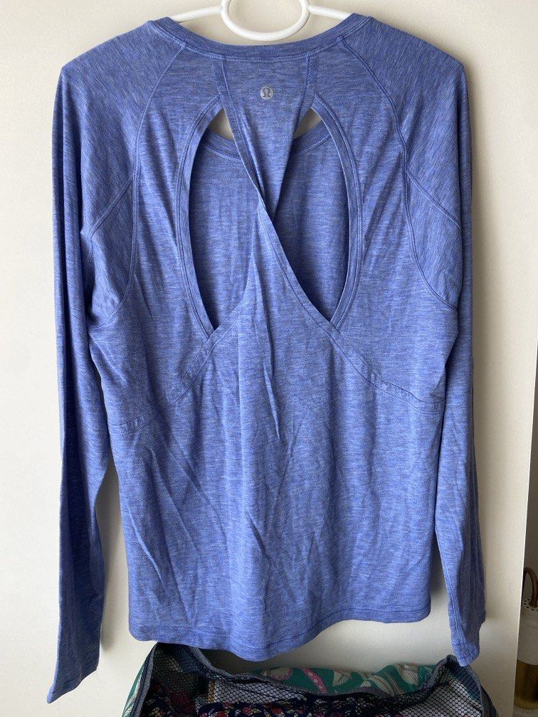 Lululemon blue long sleeve shirt (Category: Activewear) located in Pasig City. Submitted by sandace (Listing ID 1446391643, Image 3). Description: Authentic Features a lace trim infront Cut tag but estimate size 6.